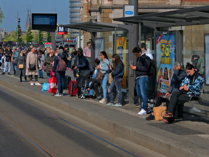 Bus stop and people waiting